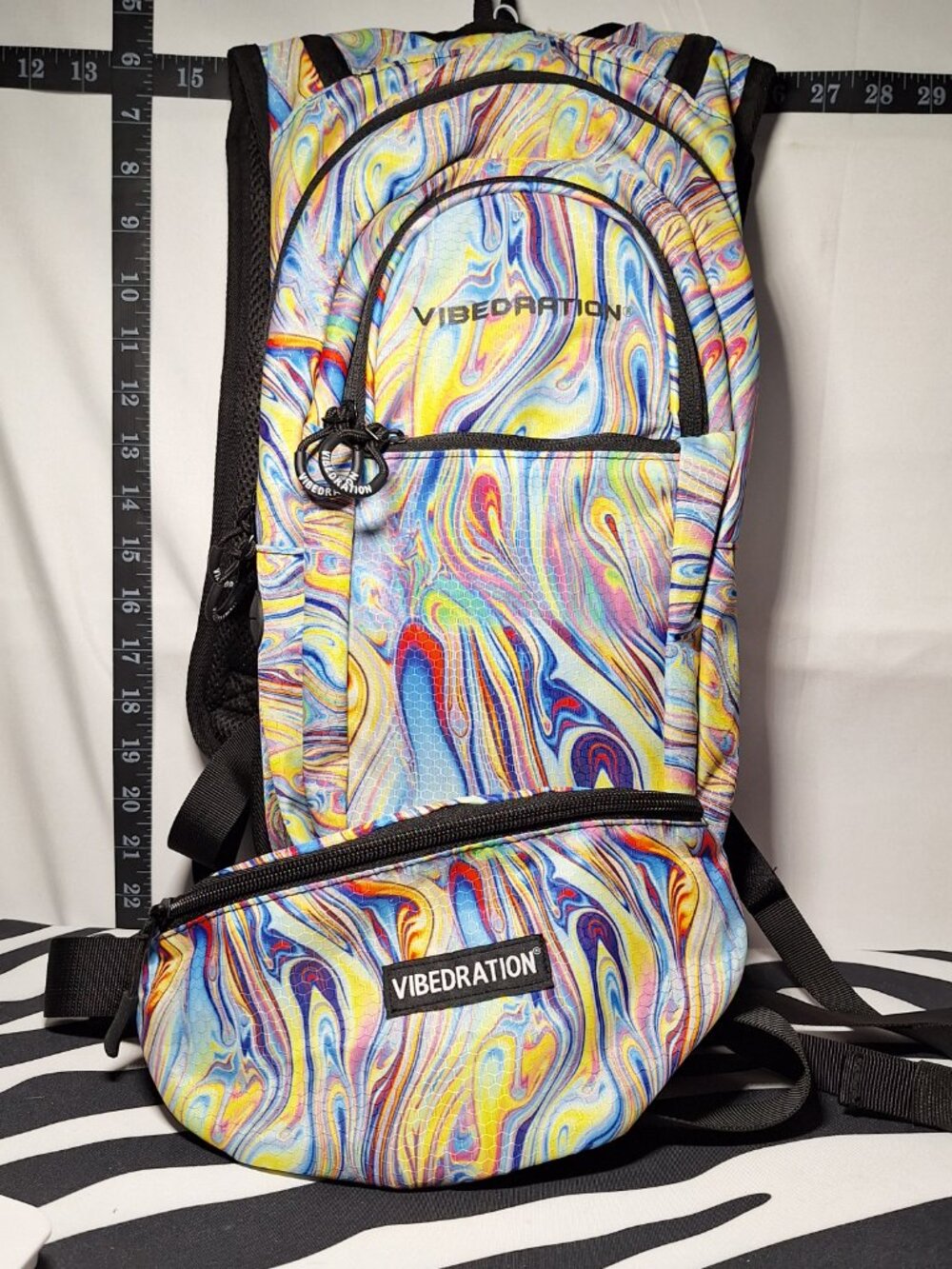 NWOT Vibedration Hydration Backpack w/Bladder & Matching Bag, Multi-Color